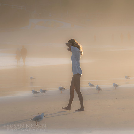 Sunset surf mist on Bondi Beach